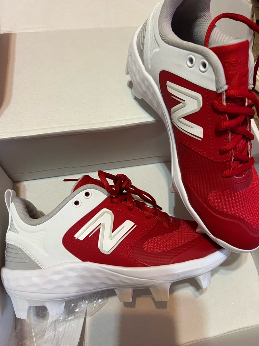 New Balance Red and White Cleats